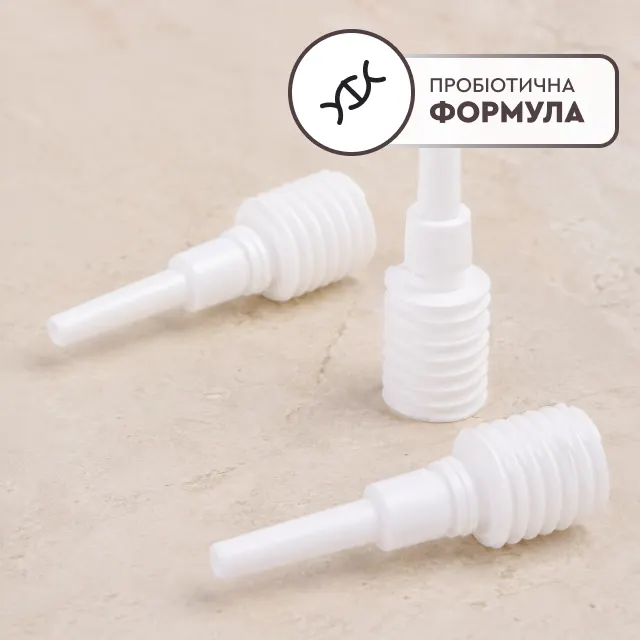 Рука держит микроклизму Dr. Procto с инновационной пробиотической формулой