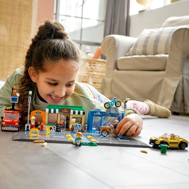 Zestaw klocków LEGO City Ulica handlowa 533 elementy (60306) - obraz 3