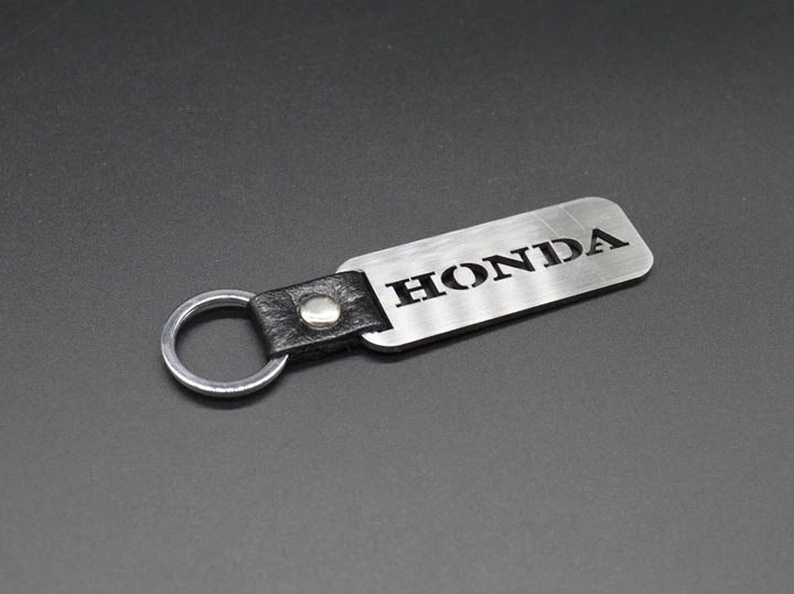 Брелок автомобільний для ключів HONDA 10х2,5 см Сріблястий (BR-817) - Фото 5 Брелок автомобільний для ключів HONDA 10х2,5 см Сріблястий (BR-817) - зображення 5
