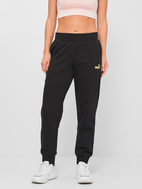 black and gold puma pants