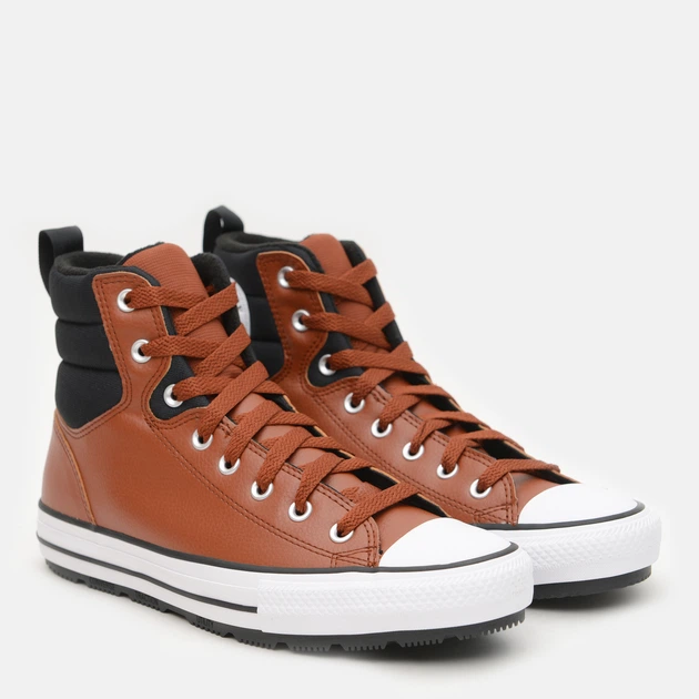 tan and black converse