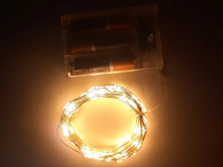 Гирлянда светодиодная на батарейках теплый свет "шампань" 100 LED длина 10 метров - Фото 4 Гирлянда светодиодная на батарейках теплый свет "шампань" 100 LED длина 10 метров - изображение 4