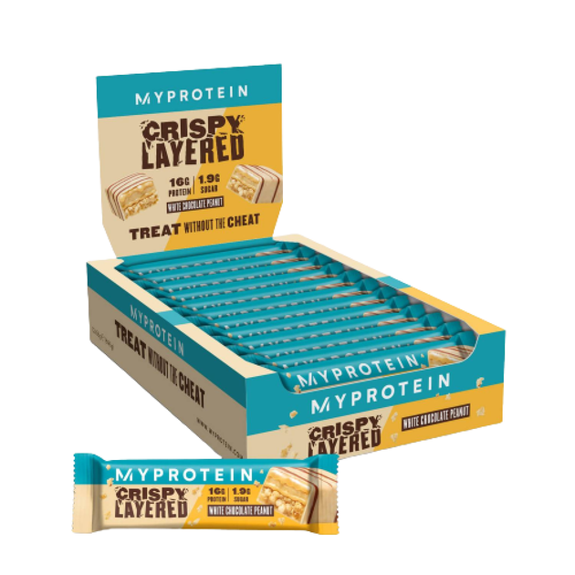 Фітнес батончики Myprotein Crispy Layered 12x58 г White Chocolate Peanut - Фото 1 Фітнес батончики Myprotein Crispy Layered 12x58 г White Chocolate Peanut - зображення 1