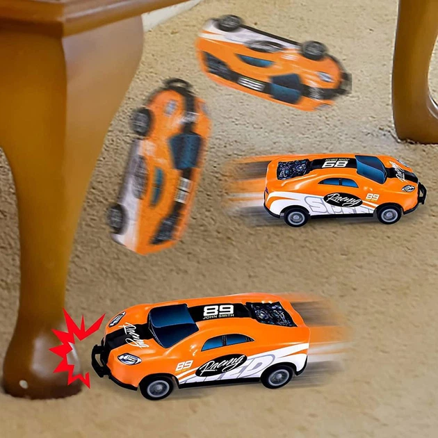 Трюкова інерційна машинка стрибаюча UFT Jump Car 89 Orange (UFTJC89) - Фото 5 Трюкова інерційна машинка стрибаюча UFT Jump Car 89 Orange (UFTJC89) - зображення 5