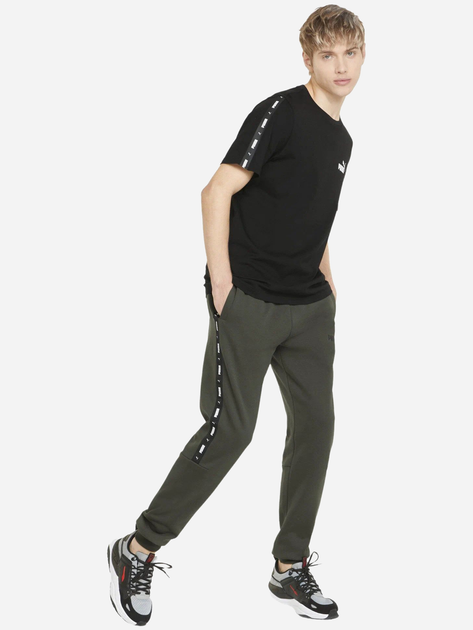 Spodnie dresowe męskie Puma Ess+ Tape Fl Cl 849042-70 M Zielone (4064535820065) - obraz 3