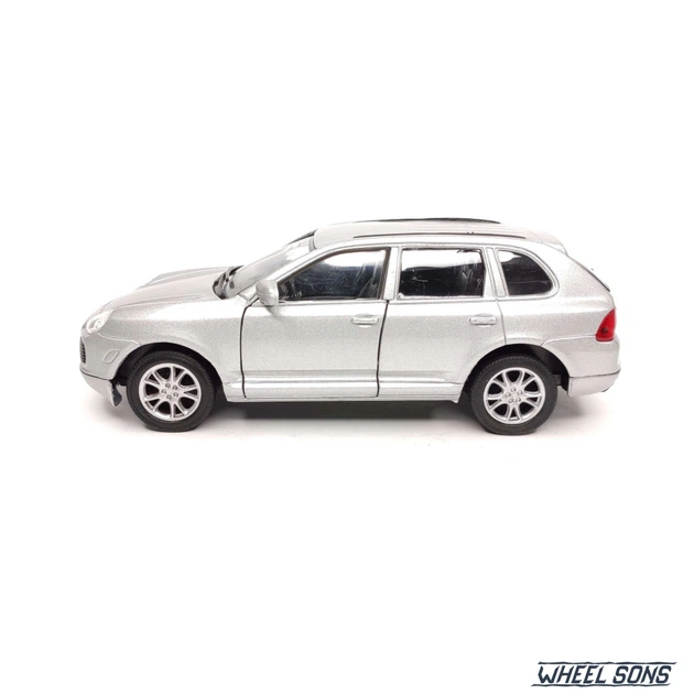 Модель автомобіля Porsche Cayenne Turbo 2003 1:31 Welly (W3072) - зображення 6