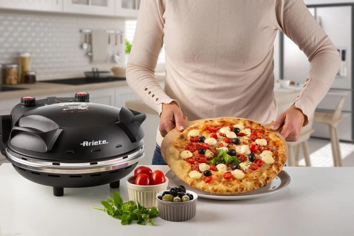 Печь для пиццы каменная Ariete 917/00 Black 1200 Вт с терморегулятором и таймером - Фото 7 Печь для пиццы каменная Ariete 917/00 Black 1200 Вт с терморегулятором и таймером - изображение 7