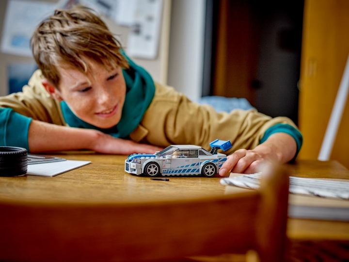 Zestaw klocków LEGO Speed Champions Nissan Skyline GT-R (R34) z filmu Za szybcy za wściekli 319 elementów (76917) - obraz 6