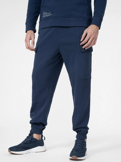 Акція на Спортивні штани чоловічі 4F Trousers Cas M138 4FSS23TTROM138-31S 2XL Сині від Rozetka