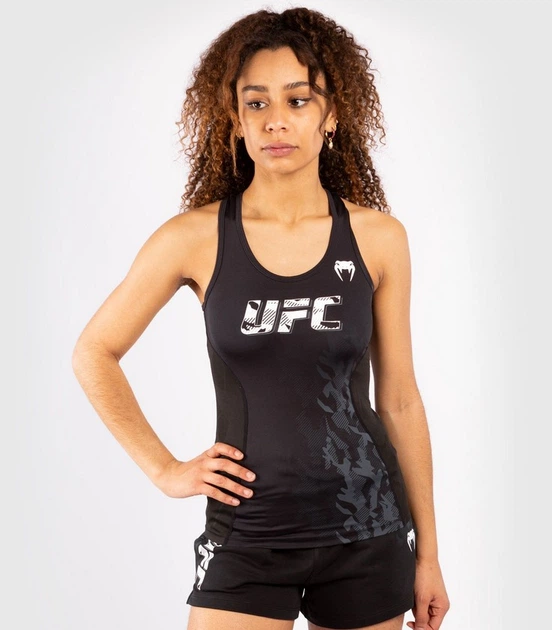 Женская майка Venum Official UFC Fight Week Dry Tech Black (VNMUFC-00025-001-XS) - Фото 1 Женская майка Venum Official UFC Fight Week Dry Tech Black (VNMUFC-00025-001-XS) - изображение 1