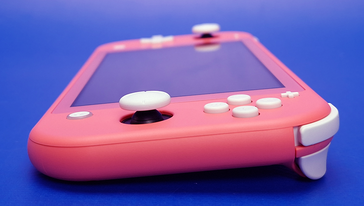 Консоль Nintendo Switch Lite 32GB (045496453176) Coral - Фото 4 Консоль Nintendo Switch Lite 32GB (045496453176) Coral - зображення 4