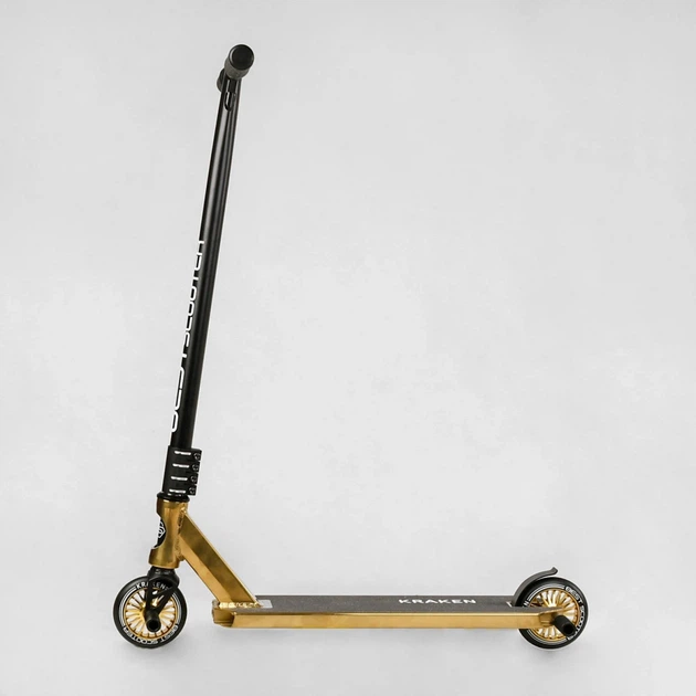Трюковий самокат Best Scooter Kraken KR-93091 з кермовою системою HIC, колеса 110 мм, анодоване фарбування + 2 пеги, Золотистий - Фото 2 Трюковий самокат Best Scooter Kraken KR-93091 з кермовою системою HIC, колеса 110 мм, анодоване фарбування + 2 пеги, Золотистий - зображення 2