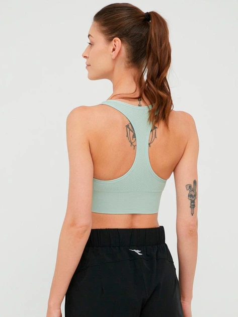 Спортивный топ женский Reebok Wor Seamless Bra H65612 S Ready Green (4065423333988) - Фото 7 Спортивный топ женский Reebok Wor Seamless Bra H65612 S Ready Green (4065423333988) - изображение 7
