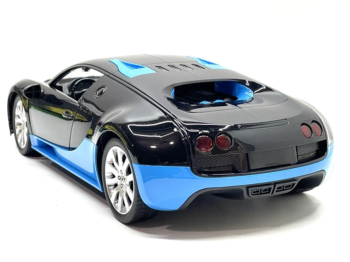 Машина на радіокеруванні Bugatti Veyron інерційна масштаб 1:12 33см Чорна з блакитним (M 4915) - зображення 7