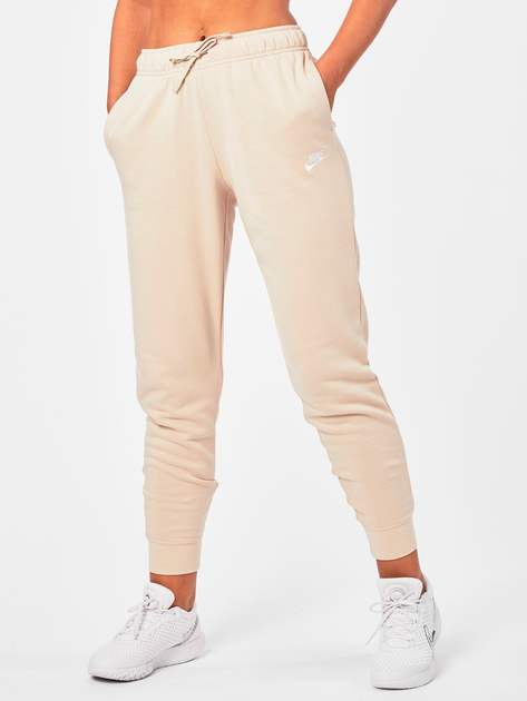Акція на Спортивные штаны на флисе женские Nike Club Fleece Pant DQ5191-126 XS Бежевый/Белый від Rozetka