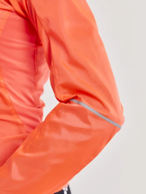 Женская велокуртка Craft Essence Light Wind Jacket Women 1908792 825000 SHOCK M - Фото 2 Женская велокуртка Craft Essence Light Wind Jacket Women 1908792 825000 SHOCK M - изображение 2