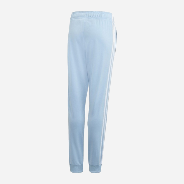 Dziecięce spodnie dresowe dla dziewczynki Adidas Superstar Pants DV2882 134 cm Błękitne (4060515196847) - obraz 2