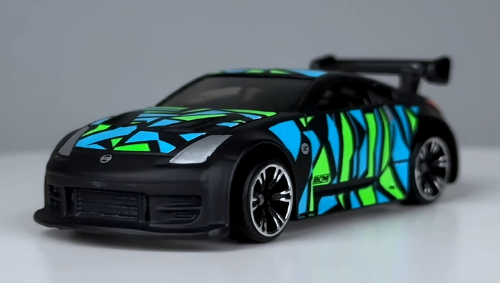 にゃページ Тематична Машинка Hot Wheels Nissan 350Z Neon Speeders 1:64 HLH72