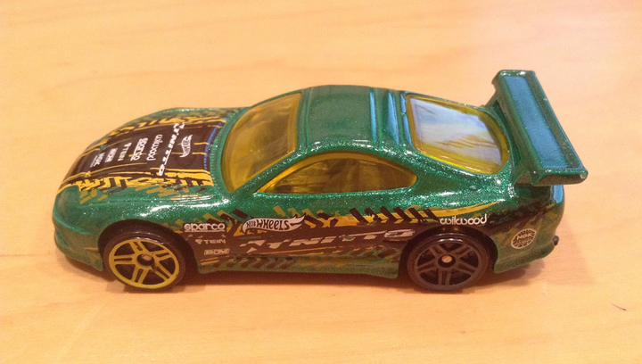 Машинка Базовая Hot Wheels Toyota Supra Speed Graphics 1:64 DHR73