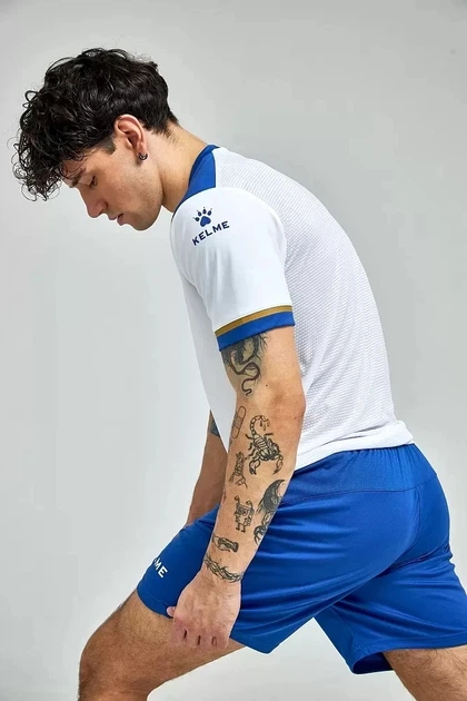 Комплект футбольной формы Kelme SEGOVIA бело-сине-желтый M 8351ZB1158.9104 - Фото 5 Комплект футбольной формы Kelme SEGOVIA бело-сине-желтый M 8351ZB1158.9104 - изображение 5