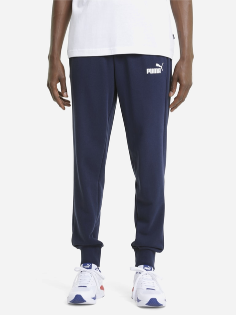 Спортивні штани чоловічі Puma Ess Logo Pants Tr Cl 58671606 L Темно-сині (4063697296886) - зображення 1