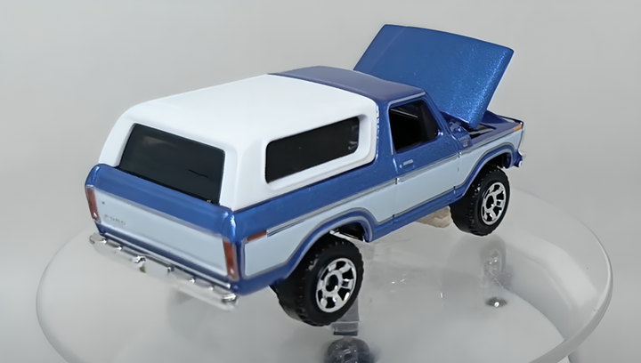 Тематична Машинка Matchbox 1978 Ford Bronco Moving Parts 1:64 FWD28/HVM87 White - Фото 4 Тематична Машинка Matchbox 1978 Ford Bronco Moving Parts 1:64 FWD28/HVM87 White - зображення 4