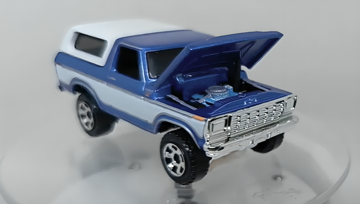 Тематична Машинка Matchbox 1978 Ford Bronco Moving Parts 1:64 FWD28/HVM87 White - Фото 6 Тематична Машинка Matchbox 1978 Ford Bronco Moving Parts 1:64 FWD28/HVM87 White - зображення 6