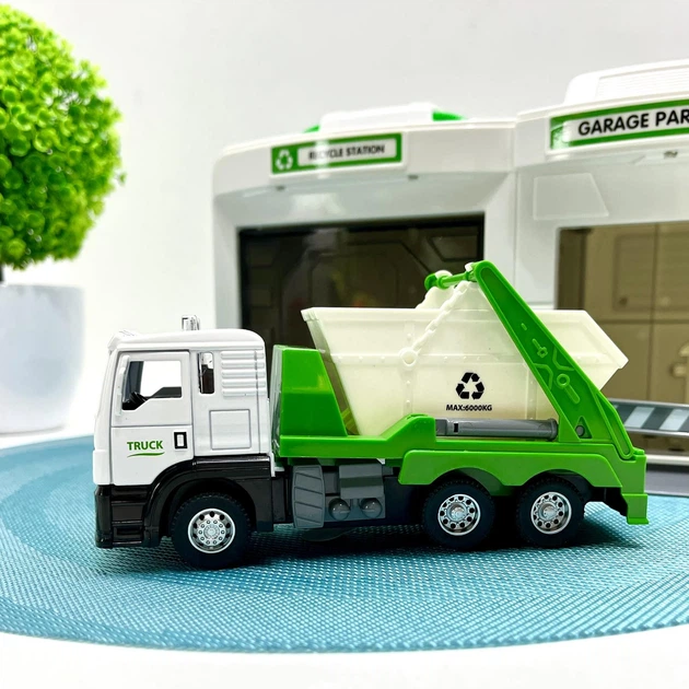 Гараж с машинкой Chengmei Toys Мусоровоз с контейнером с световыми и звуковыми эффектами Бело-зеленый (CLM-552) - Фото 5 Гараж с машинкой Chengmei Toys Мусоровоз с контейнером с световыми и звуковыми эффектами Бело-зеленый (CLM-552) - изображение 5