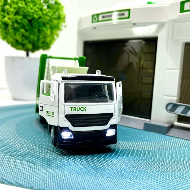 Гараж с машинкой Chengmei Toys Мусоровоз с контейнером с световыми и звуковыми эффектами Бело-зеленый (CLM-552) - Фото 6 Гараж с машинкой Chengmei Toys Мусоровоз с контейнером с световыми и звуковыми эффектами Бело-зеленый (CLM-552) - изображение 6