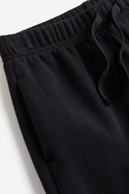 Утепленнні спортивні брюки H&M пх10384 чорні 146 - Фото 2 Утепленнні спортивні брюки H&M пх10384 чорні 146 - изображение 2
