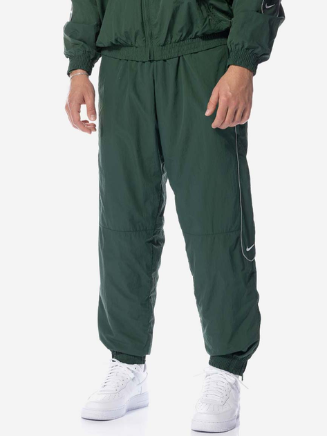 Спортивні штани чоловічі Nike FB8620-323 M Зелені (196607423585) - зображення 1