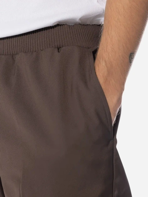 Spodnie regular fit męskie Nike FB7525-237 L Brązowe (196607626153) - obraz 6