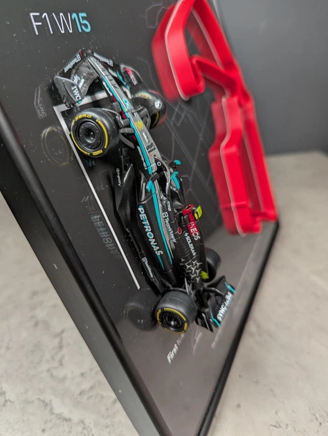 Модель Bburago с Рамкой Держателем 2в1 на Стену или Полку с F1 W15 Mercedes и 3D Трассой British Grand Prix "Silverstone" / Сезон 2024 Season Model Car #44 Lewis Hamilton / Льюис Гамильтон - Фото 12 Модель Bburago с Рамкой Держателем 2в1 на Стену или Полку с F1 W15 Mercedes и 3D Трассой British Grand Prix "Silverstone" / Сезон 2024 Season Model Car #44 Lewis Hamilton / Льюис Гамильтон - изображение 12