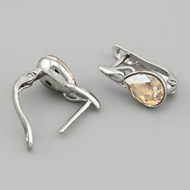 Серьги с кристаллами Swarovski 49191 размер 15х7 мм цвет шампань вес 2.0 г позолота Белое Золото - Фото 2 Серьги с кристаллами Swarovski 49191 размер 15х7 мм цвет шампань вес 2.0 г позолота Белое Золото - изображение 2