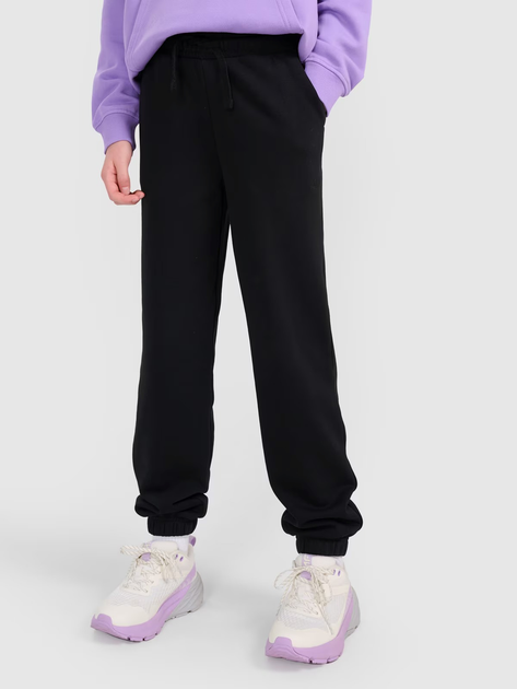 Spodnie dresowe dziecięce dla dziewczynki joggery 4F 4FJWMM00TTROF1189-20S 128 cm Czarne (5905700384656) - obraz 1