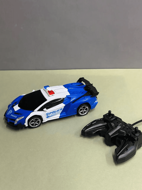 Спорткар-трансформер на пульті ToyCloud 19см Поліція 1:18 звук та підсвічування 27-8KX - зображення 7