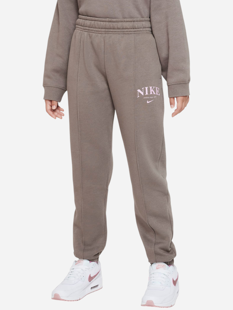 Spodnie dresowe dziewczęce młodzieżowe ocieplane Nike G Nsw Trend Flc Cf Pant DZ4616-040 M (137-147 cm) Brązowe - obraz 1