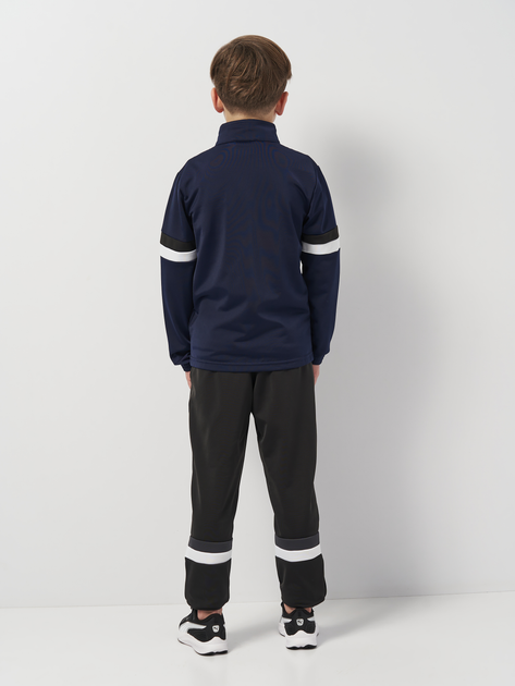 Детский спортивный костюм (толстовка + штаны) для мальчика Puma Teamrise Tracksuit Jr 65865506 134-140 см Navy-Black (4067978012561) 