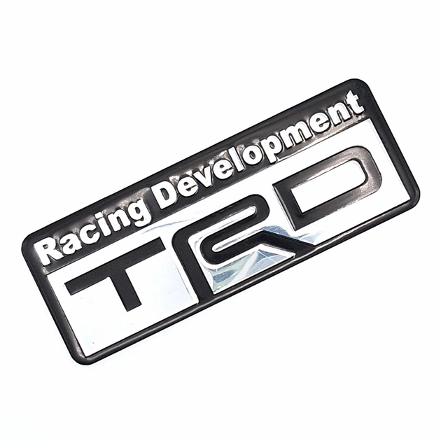Эмблема алюминиевая Racing Development TRD Toyota (чёрный+хром) 8,0*3,0 см - Фото 1 Эмблема алюминиевая Racing Development TRD Toyota (чёрный+хром) 8,0*3,0 см - изображение 1