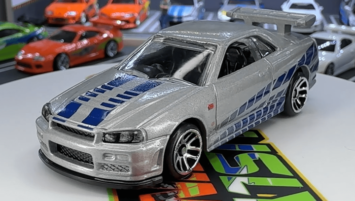 Набір Тематична Машинка Hot Wheels Mitsubishi 1995 Mitsubishi Eclipse Brian O'Conner Fast & Furious 1:64 JBY29 Green + Toyota Supra Brian O'Conner Orange + Nissan Skyline GT-R (BNR34) Brian O'Conner Silver + 1970 Ford Escort RS1600 Brian O'Conner Blue + - Фото 4 Набір Тематична Машинка Hot Wheels Mitsubishi 1995 Mitsubishi Eclipse Brian O'Conner Fast & Furious 1:64 JBY29 Green + Toyota Supra Brian O'Conner Orange + Nissan Skyline GT-R (BNR34) Brian O'Conner Silver + 1970 Ford Escort RS1600 Brian O'Conner Blue + - зображення 4