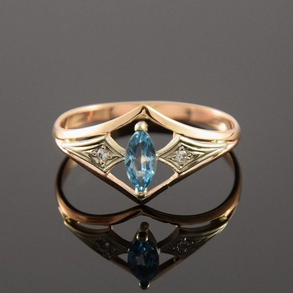 Кольцо из красного и белого золота с топазом 18 K-0143 - Фото 1 Кольцо из красного и белого золота с топазом 18 K-0143 - изображение 1