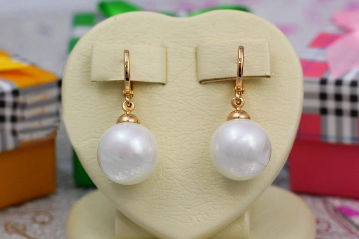 Сережки підвіски Xuping Jewelry з перлиною 12 мм золотисті - Фото 1 Сережки підвіски Xuping Jewelry з перлиною 12 мм золотисті - зображення 1