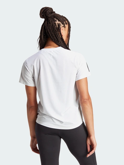 Спортивная футболка для бега женская Adidas Own The Run IK7442 L White (4067887018715) - Фото 2 Спортивная футболка для бега женская Adidas Own The Run IK7442 L White (4067887018715) - изображение 2