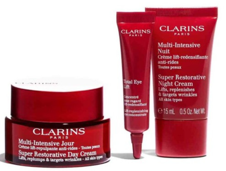 Набір для догляду за обличчям Clarins Super Restorative Collection Крем денний 50 мл + Крем нічний 15 мл + Крем для повік Total Eye Lift 7 мл + Косметичка 1 шт (3666057297397) - зображення 3