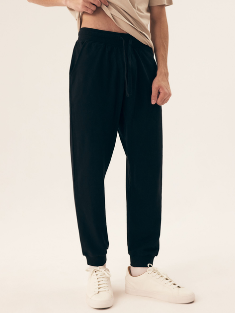 Spodnie joggery męskie Henderson Motion 43039-99X L Czarne - obraz 1