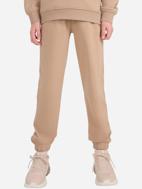 Spodnie dresowe dziewczęce młodzieżowe joggery 4F 4FJWSS25TTROF1187-83S 140 cm Beżowe (5905700426158) - obraz 1