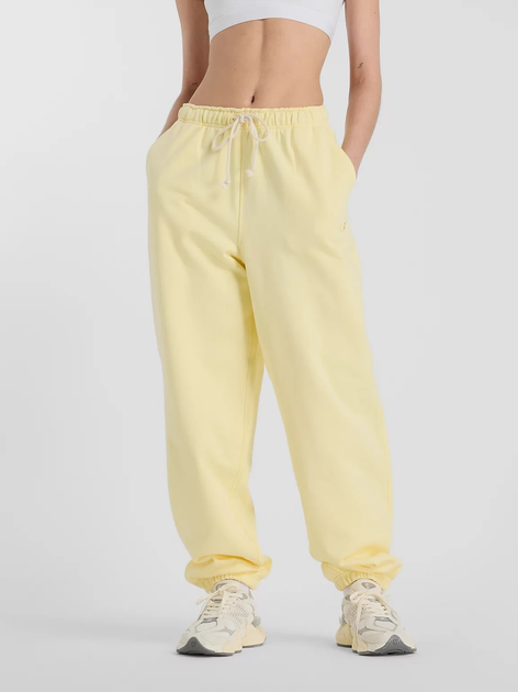 Спортивні штани жіночі New Balance Nb Athletics WP41513 L Жовті (197967309977) - зображення 1