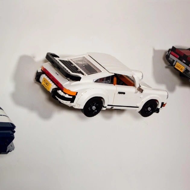 Кронштейн / Настінне 3D Кріплення для Фірмового конструктора Icons expert Porsche 911 Порше (10295) - Чорний - Фото 3 Кронштейн / Настінне 3D Кріплення для Фірмового конструктора Icons expert Porsche 911 Порше (10295) - Чорний - зображення 3