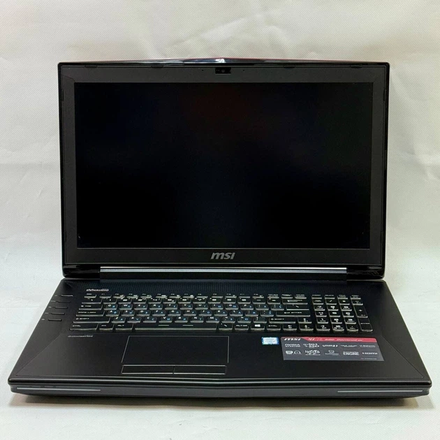 Игровой ноутбук Б-класс MSI GT72-6QD Dominator G / 17.3" (1920x1080) IPS / Intel Core i7-6700HQ (4 (8) ядра по 2.6 - 3.5 GHz) / 16 GB DDR4 / 128 GB SSD + 500 GB HDD / nVidia GeForce GTX 970M, 3 GB GDDR5, 192-bit / WebCam / DVD-ROM / Windows 10 Pro б/у - Фото 4 Игровой ноутбук Б-класс MSI GT72-6QD Dominator G / 17.3" (1920x1080) IPS / Intel Core i7-6700HQ (4 (8) ядра по 2.6 - 3.5 GHz) / 16 GB DDR4 / 128 GB SSD + 500 GB HDD / nVidia GeForce GTX 970M, 3 GB GDDR5, 192-bit / WebCam / DVD-ROM / Windows 10 Pro б/у - изображение 4