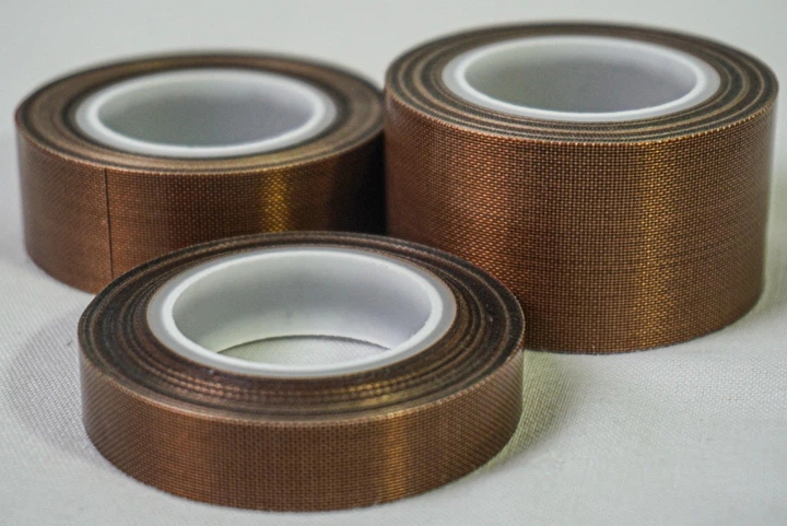 Тефлоновая PTFE-лента 40 мм × 10 м, PTFE 80 мкм + клей 50 мкм для запаечного оборудования - Фото 7 Тефлоновая PTFE-лента 40 мм × 10 м, PTFE 80 мкм + клей 50 мкм для запаечного оборудования - изображение 7